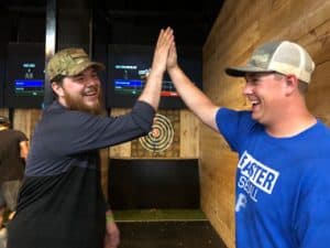 axe throwing with projected targets and games created by Axcitement.com.
